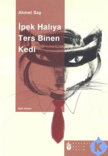 İPEK HALIYA TERS BİNEN KEDİ